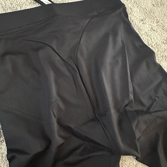Nike Sleek Black Outerwear skims collab